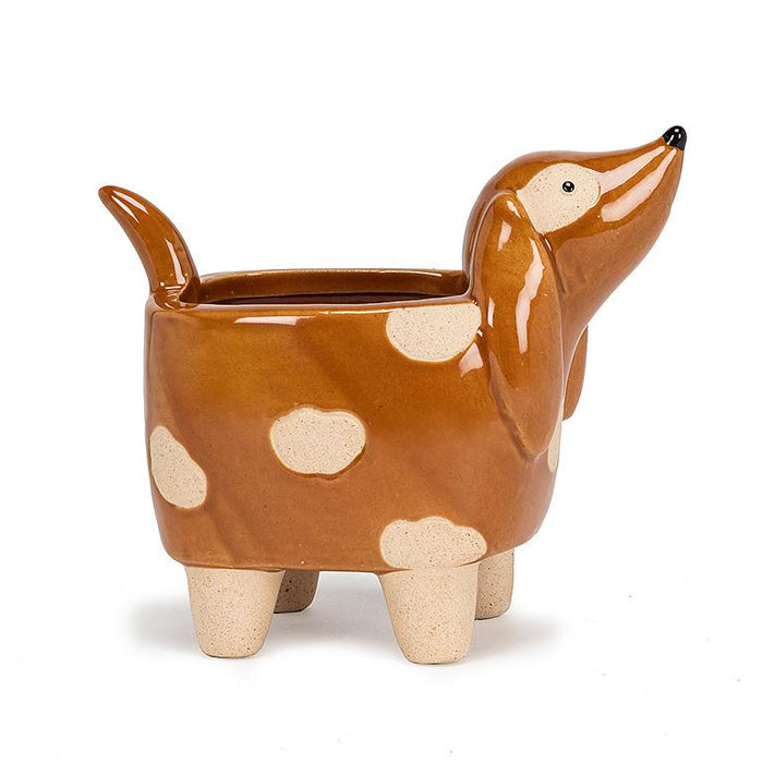 Petit pot en forme de chien sur pattes